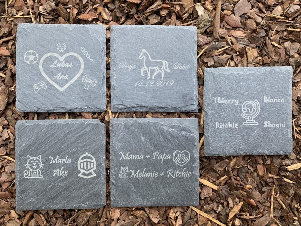 Elegante Steintafeln mit personalisierten Gravuren für verschiedene Anlässe, ideal für Dekorationen und Geschenke, hergestellt bei Laserart Kevin Langer in Lübbecke.
